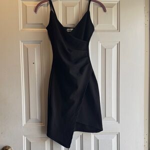 Almost Famous Black Asymmetrical Dress Size XXS. Excellent Condition